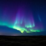 Immagine di auroras boreales nel cielo notturno